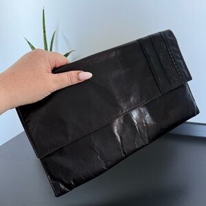 Vintage 1970s oversized black leather Simpsons clutch bag